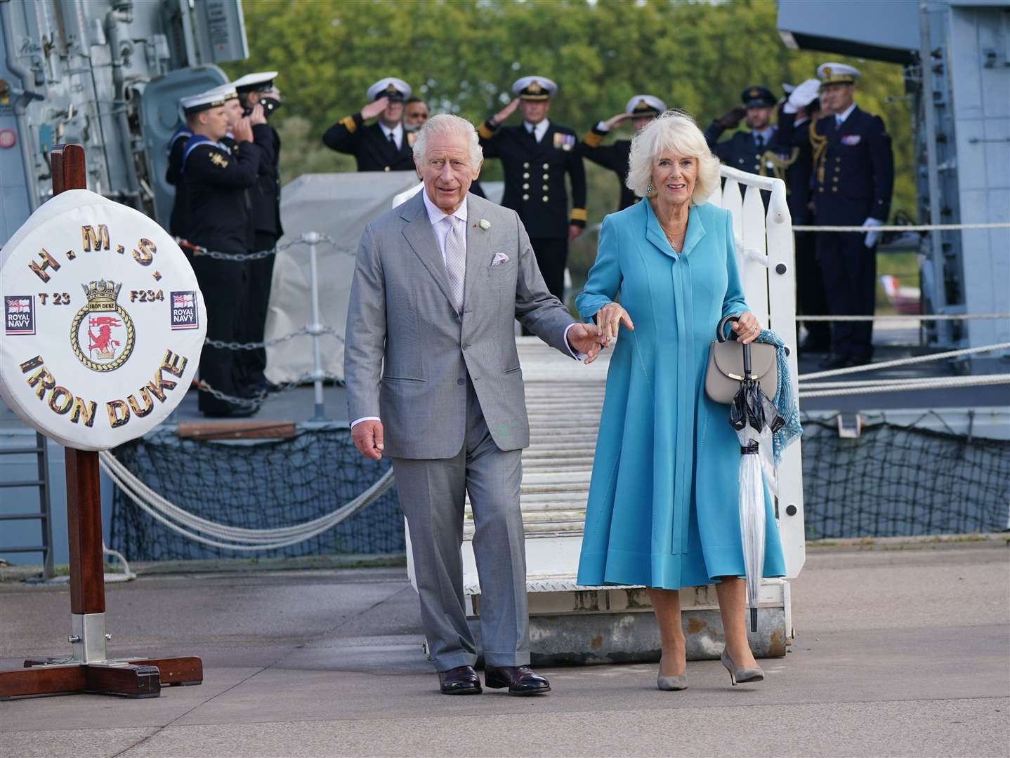 Charles and Camilla mingled with guests on HMS Iron Duke (Yui Mok/PA)