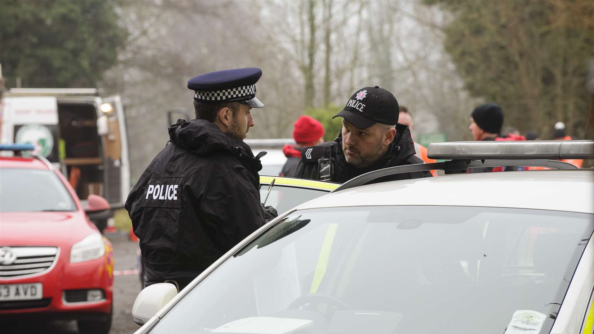 Kent Police, firefighters and search and rescue organisations at the fishing lakes at the foot of Gravel Road, Sutton-At-Hone.