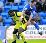 Adam Miller battles with Pablo Mills. Picture: Grant Falvey