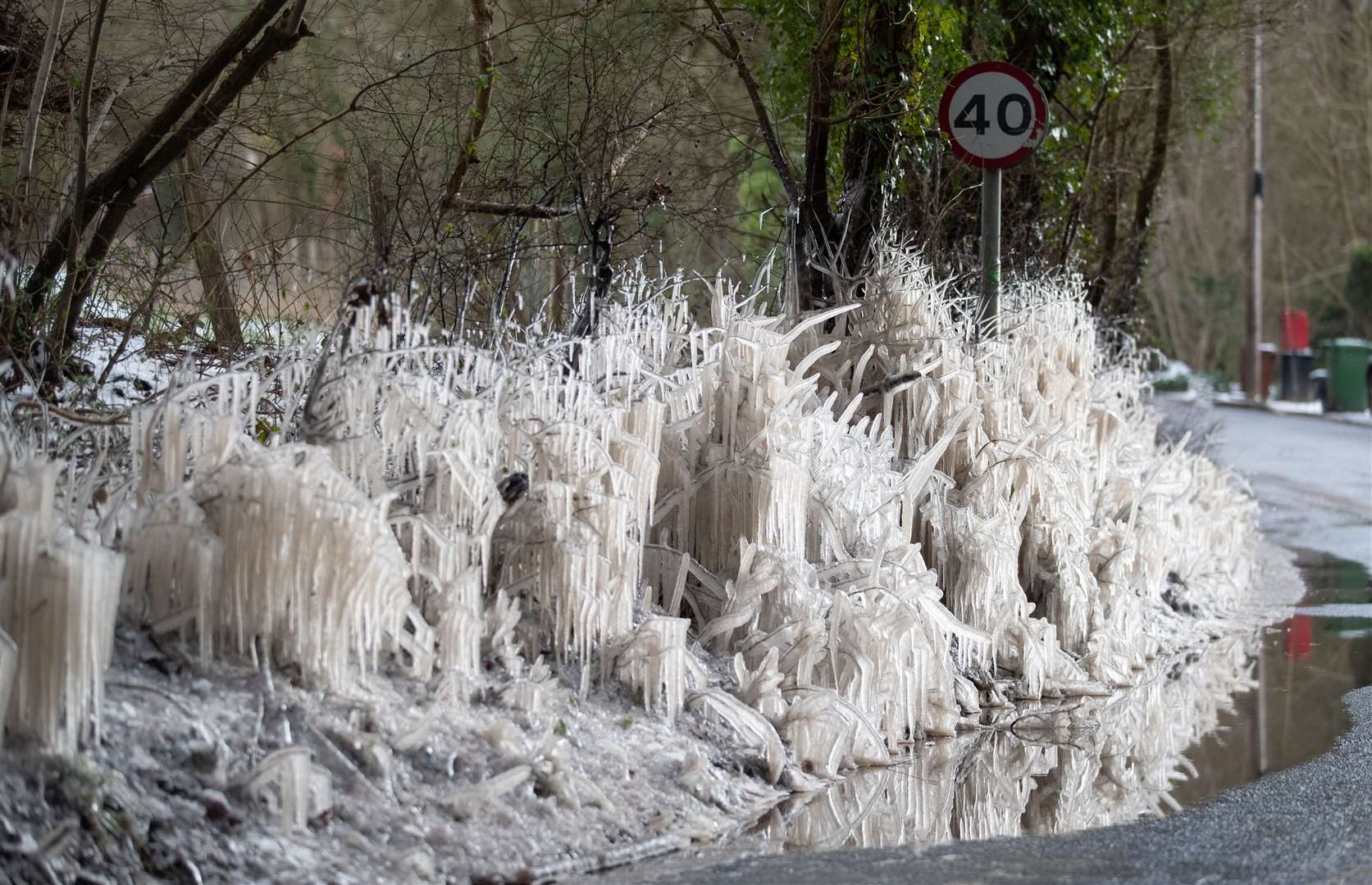 Icicles form at the side of a road near Penshurst in Kent (Andrew Matthews/PA)