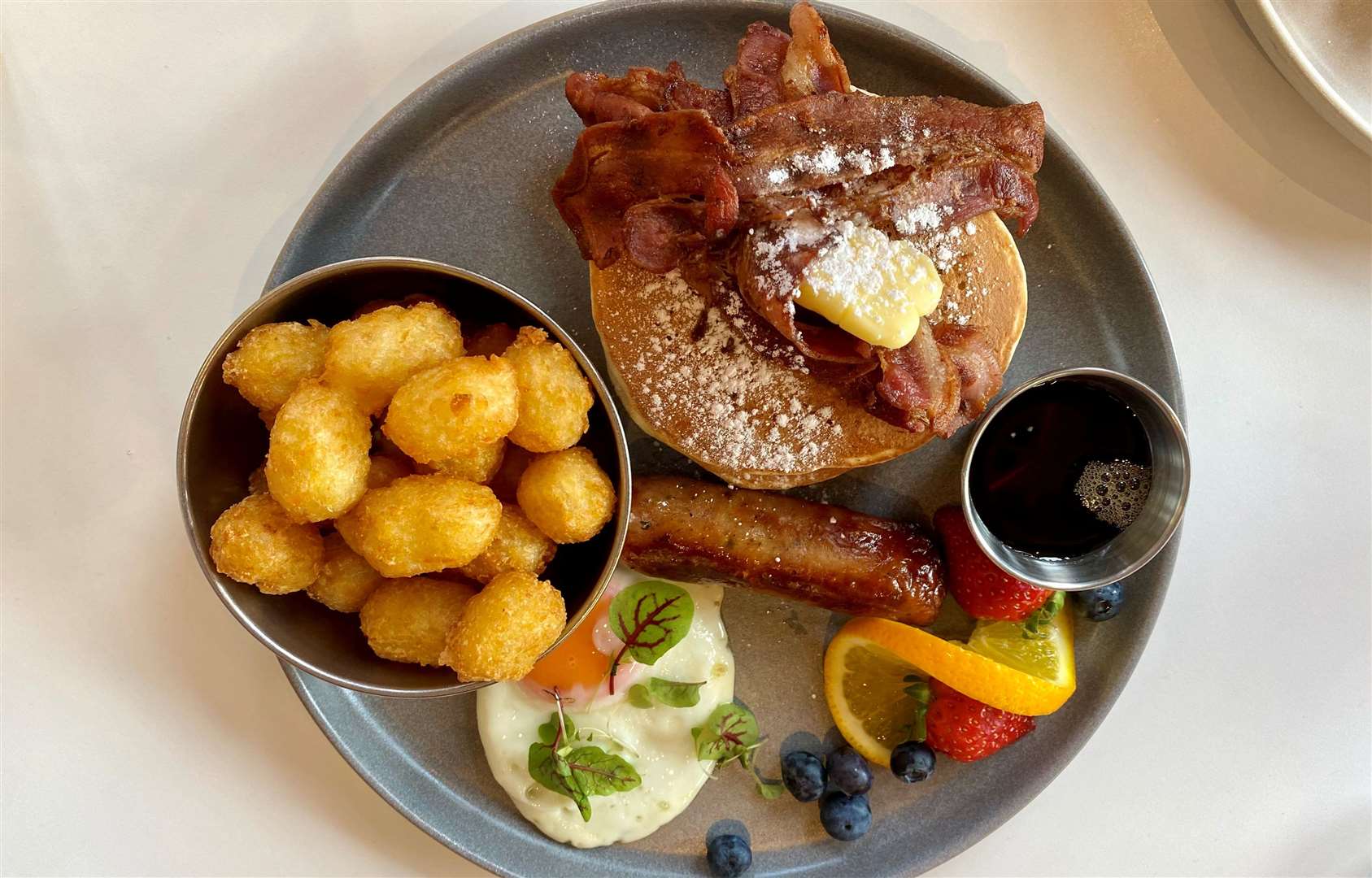 The All-American breakfast had everything - potatoes, pancakes, bacon, sausage, eggs and fruit