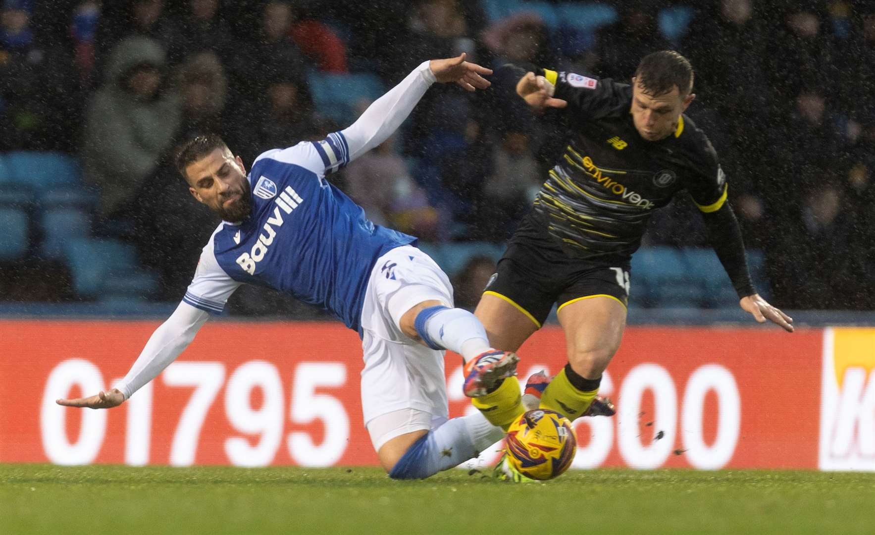 Gillingham captain Max Ehmer puts in a challenge during the home defeat to Harrogate on Saturday Picture: Julian_KPI