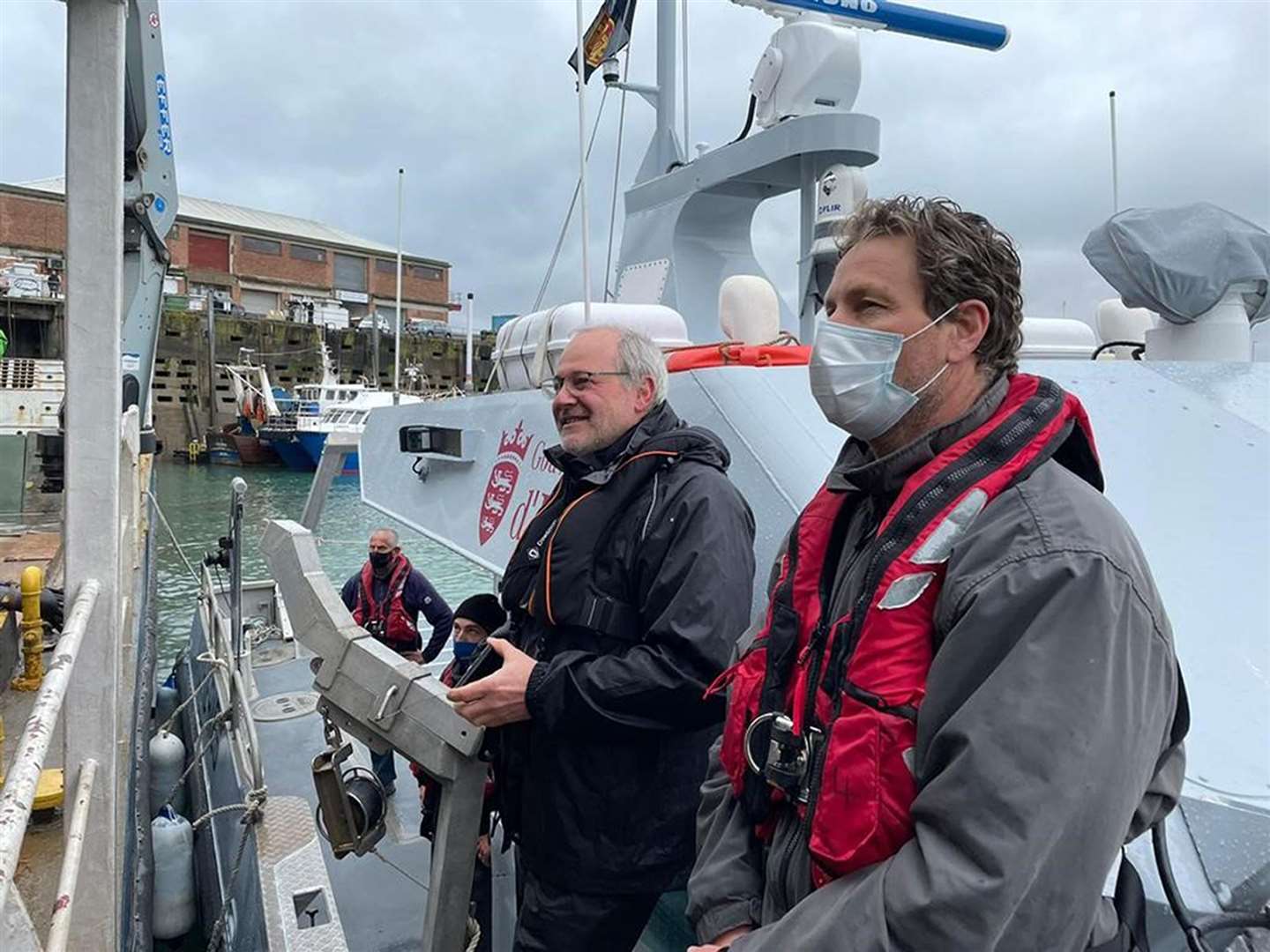 Assistant minister for the environment, Gregory Guida, and Gregory Morel, Natural Environment Marine Resources, aboard the Jersey vessel (Government of Jersey/PA)