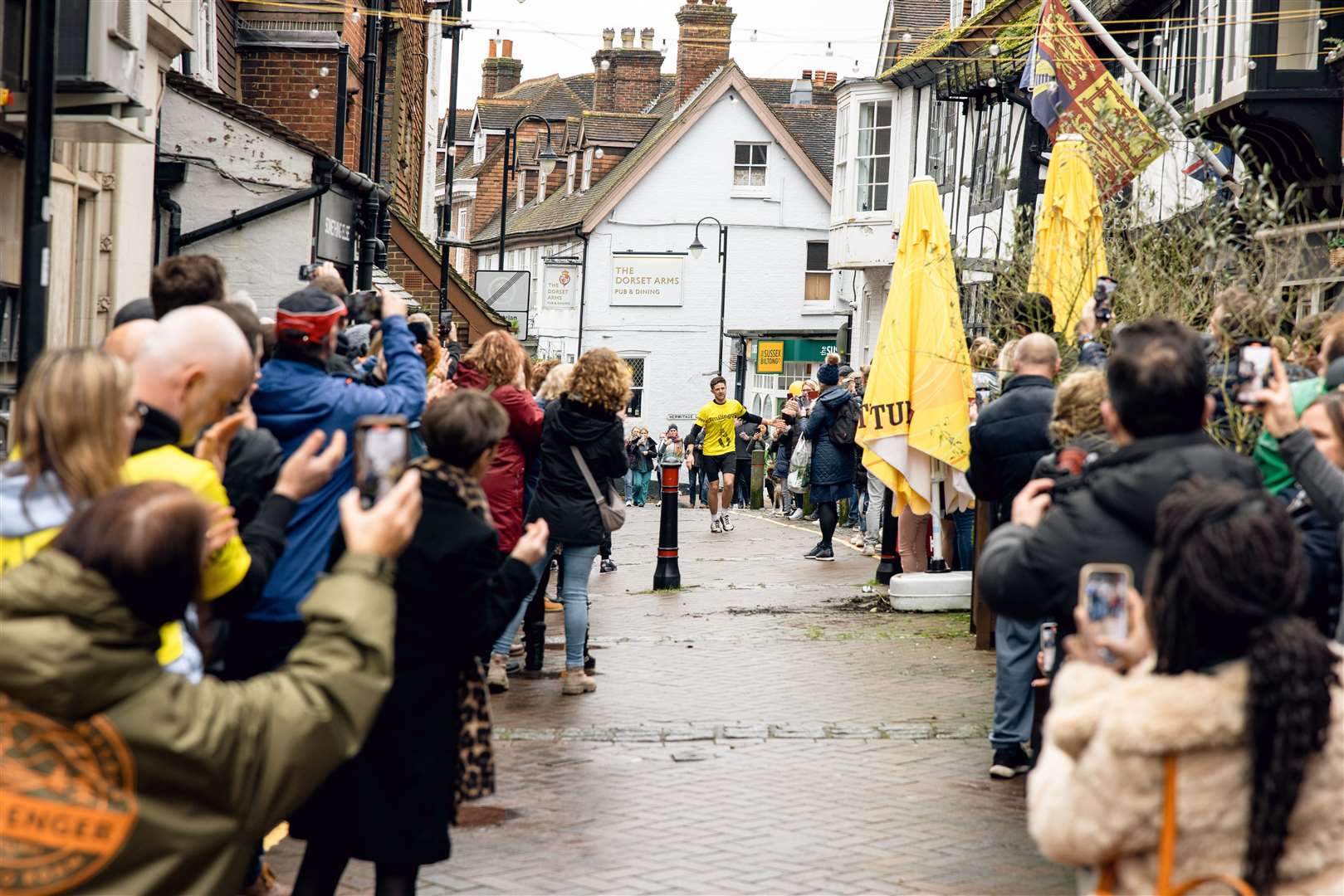 James Cooper approaches the finish line of his final marathon of the year – 366 in total – on Middle Row, East Grinstead (Cameron Pettitt and Harry Manser)