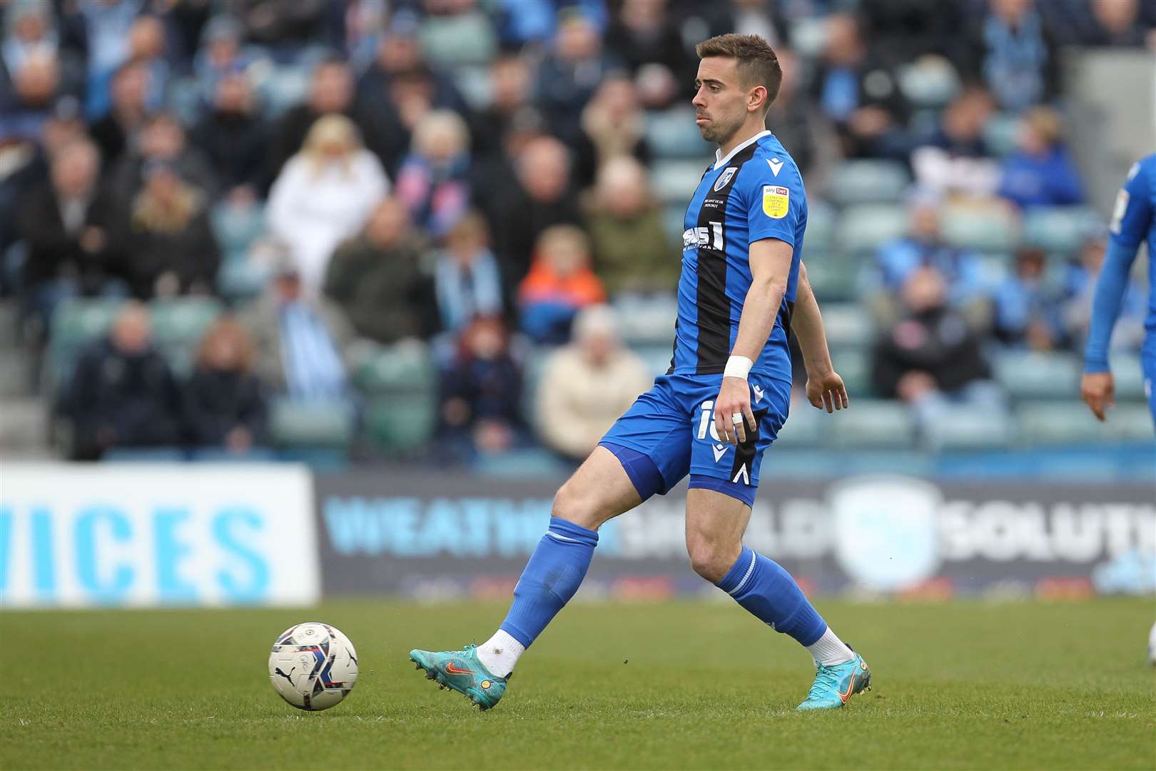 Olly Lee with the ball for Gillingham Picture: KPI