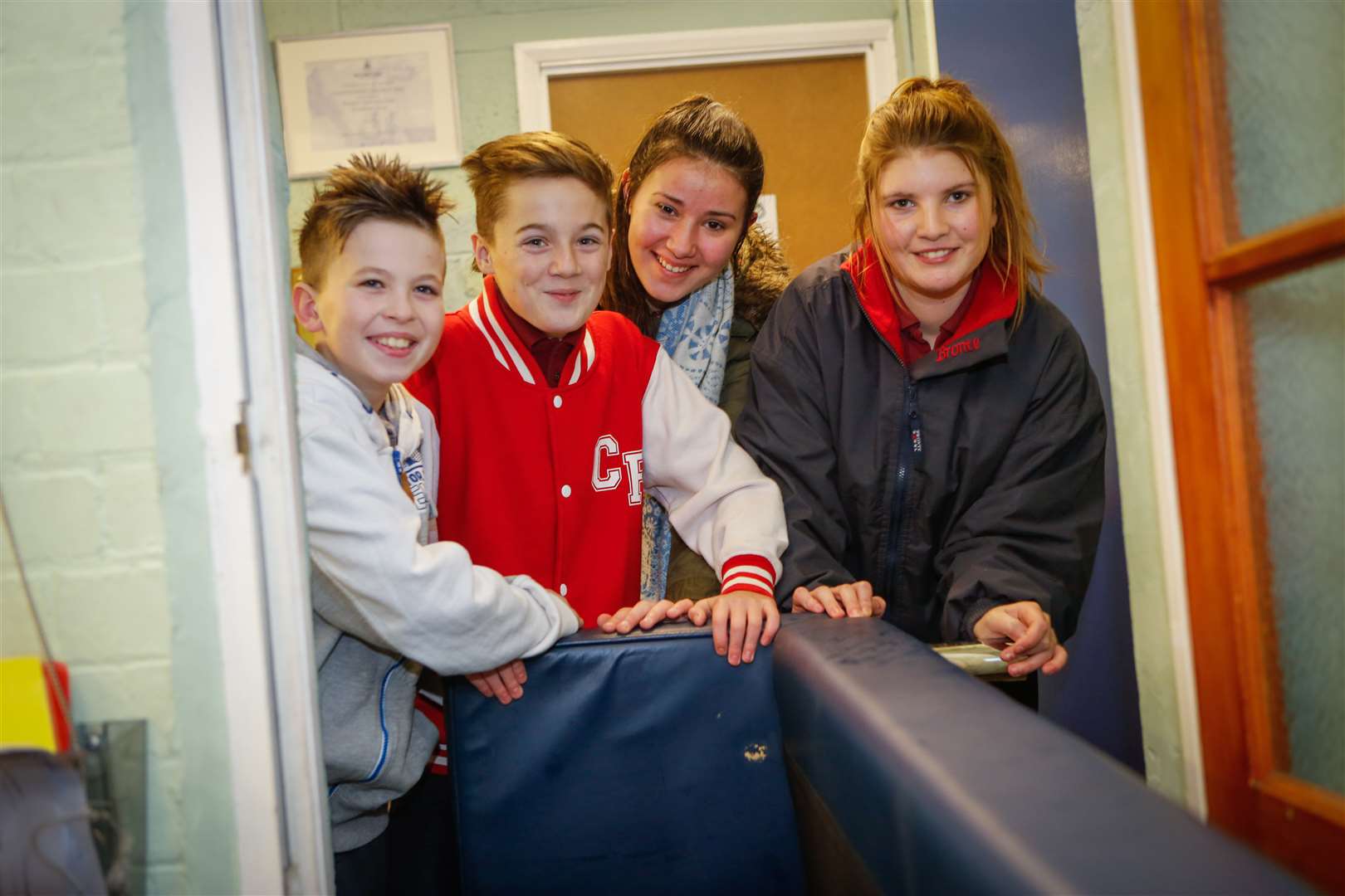 Leading Junior Cdt Danny Love, Cdt 1st class Callum Reeves, Ordinary Cdt Keah Monk and Cdt Hannah Brown pushing a sofa