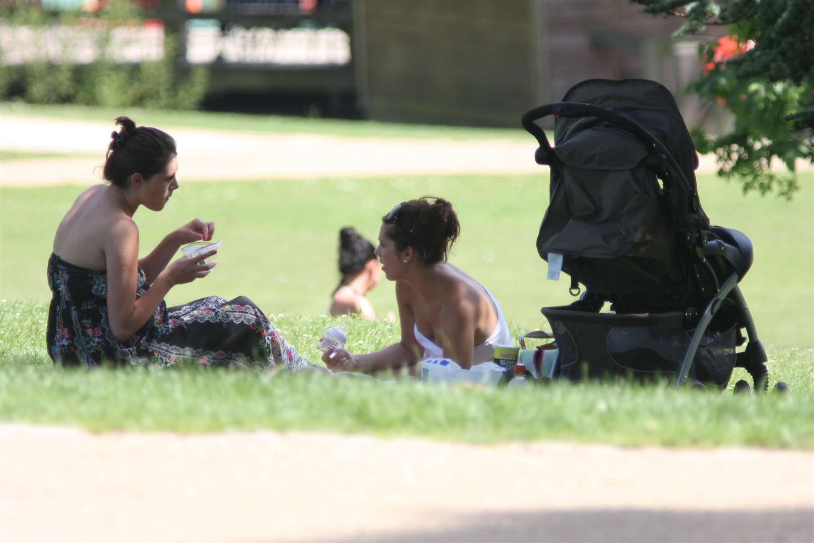 Friends relax in Dunorlan park in Tunbridge Wells. Picture: John Westhrop