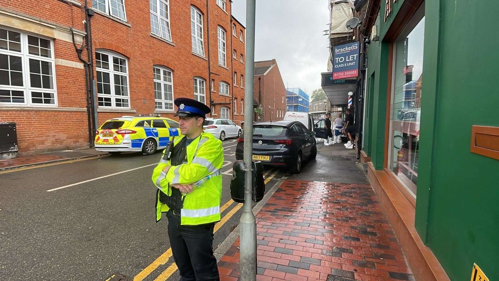 Officers at the scene in Avebury Avenue, Tonbridge after the incident on August 19