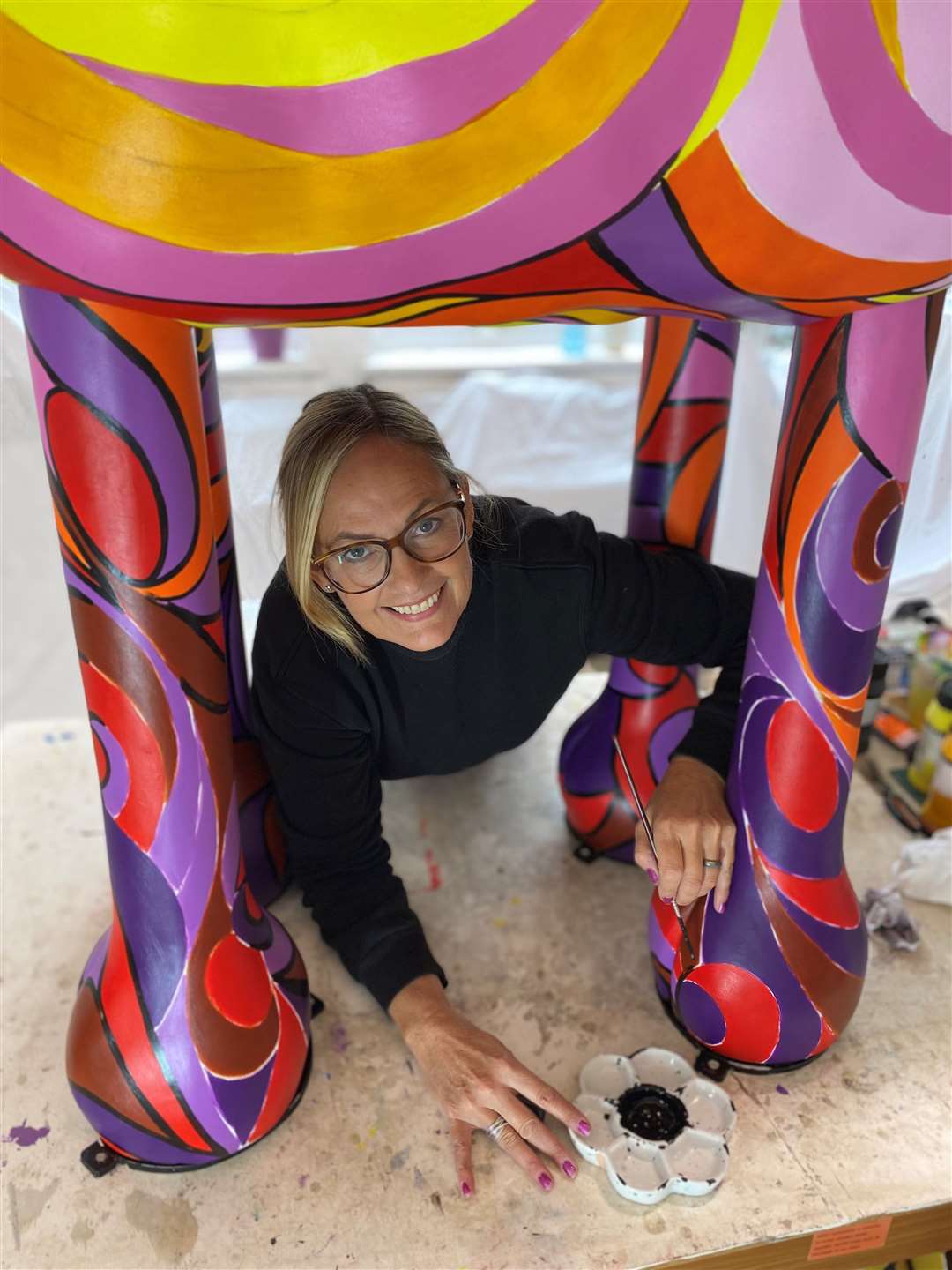 Artist Jill Busby, working on her sculpture