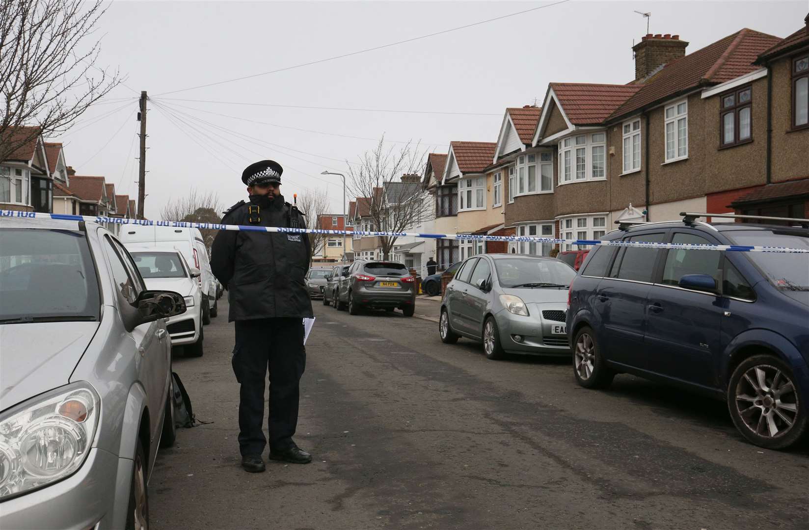 Police at the scene in Tavistock Gardens, Ilford (Jonathan Brady/PA)