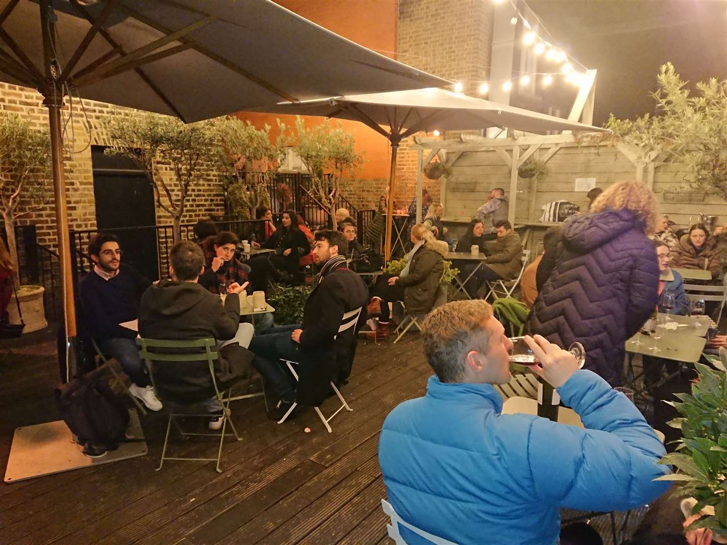 Punters enjoying a drink on the terrace at Mercato Mayfair