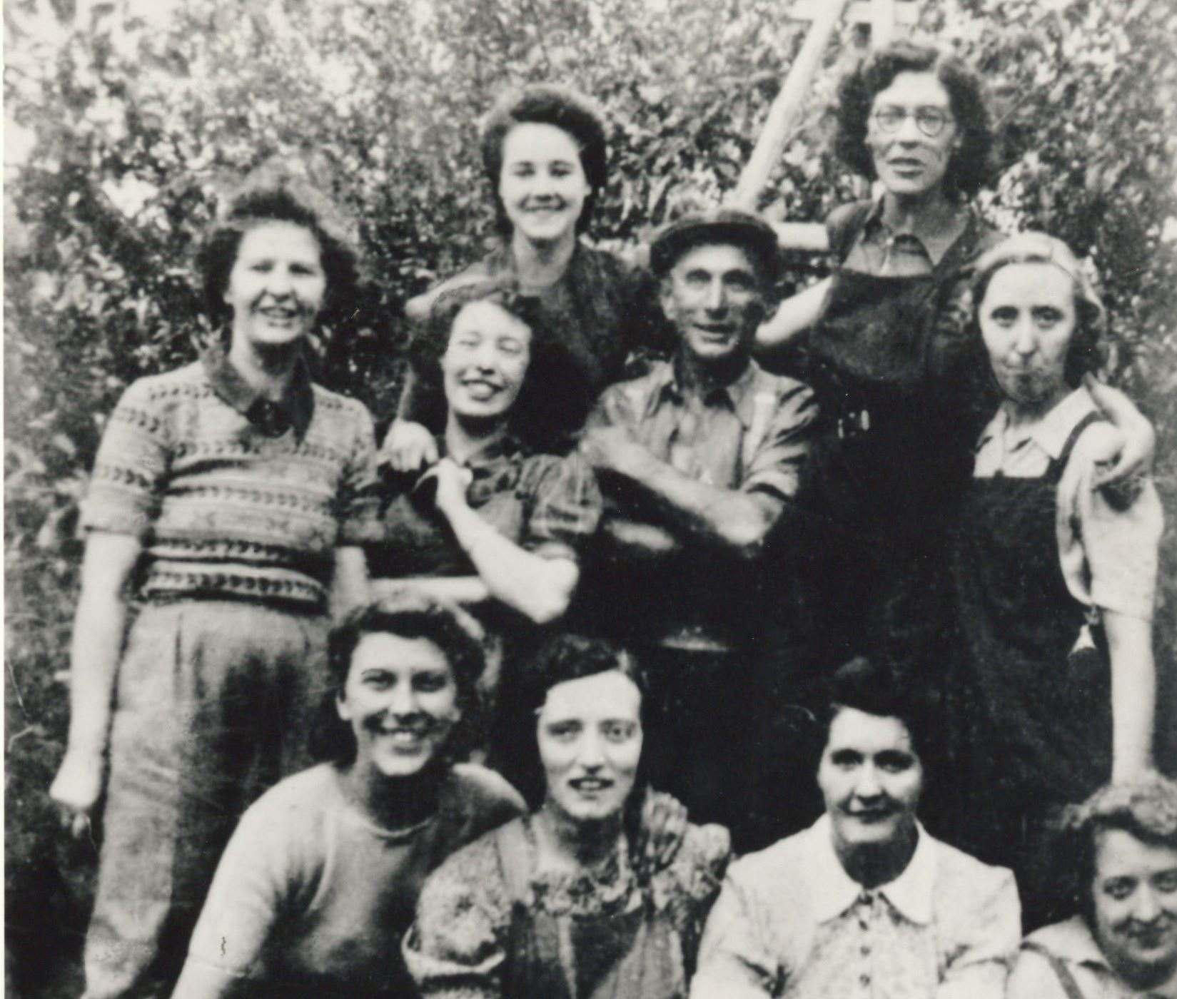 Canterbury M&S staff, on a break from picking apples in a Kentish orchard in 1942. Picture: M&S