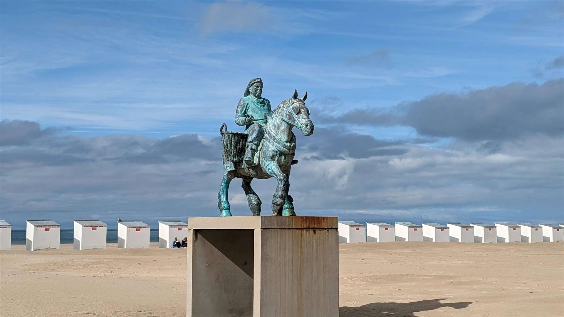 A statue of a traditional shrimp fisherman in Oostduinkerke