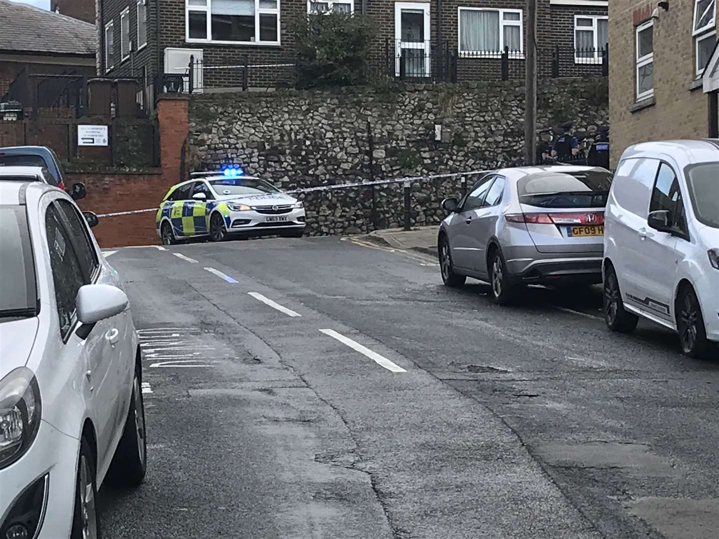 Officers were seen at the junction of Delce Road and Foord Street