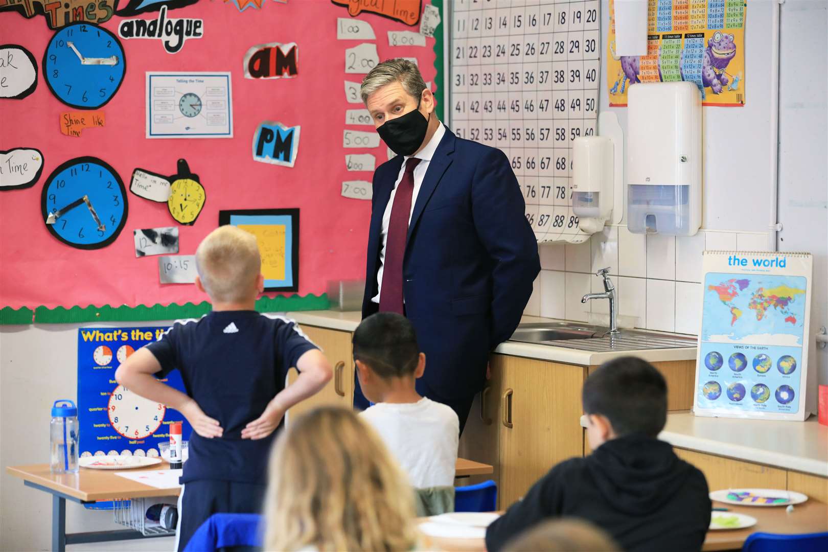 Sir Keir during a visit to Forge Integrated Primary School in Belfast (Peter Morrison/PA)