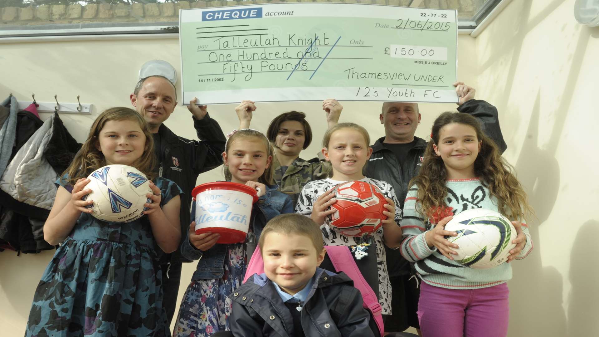 Back: Paul Lichfield, Rebecca Hopson and Gary Tuffin. Girls L-R: Ruby Govier (7), Annie Rayfield (9), Megan Alabaster (10) and Molly Tuffin (10) with Talleulah.