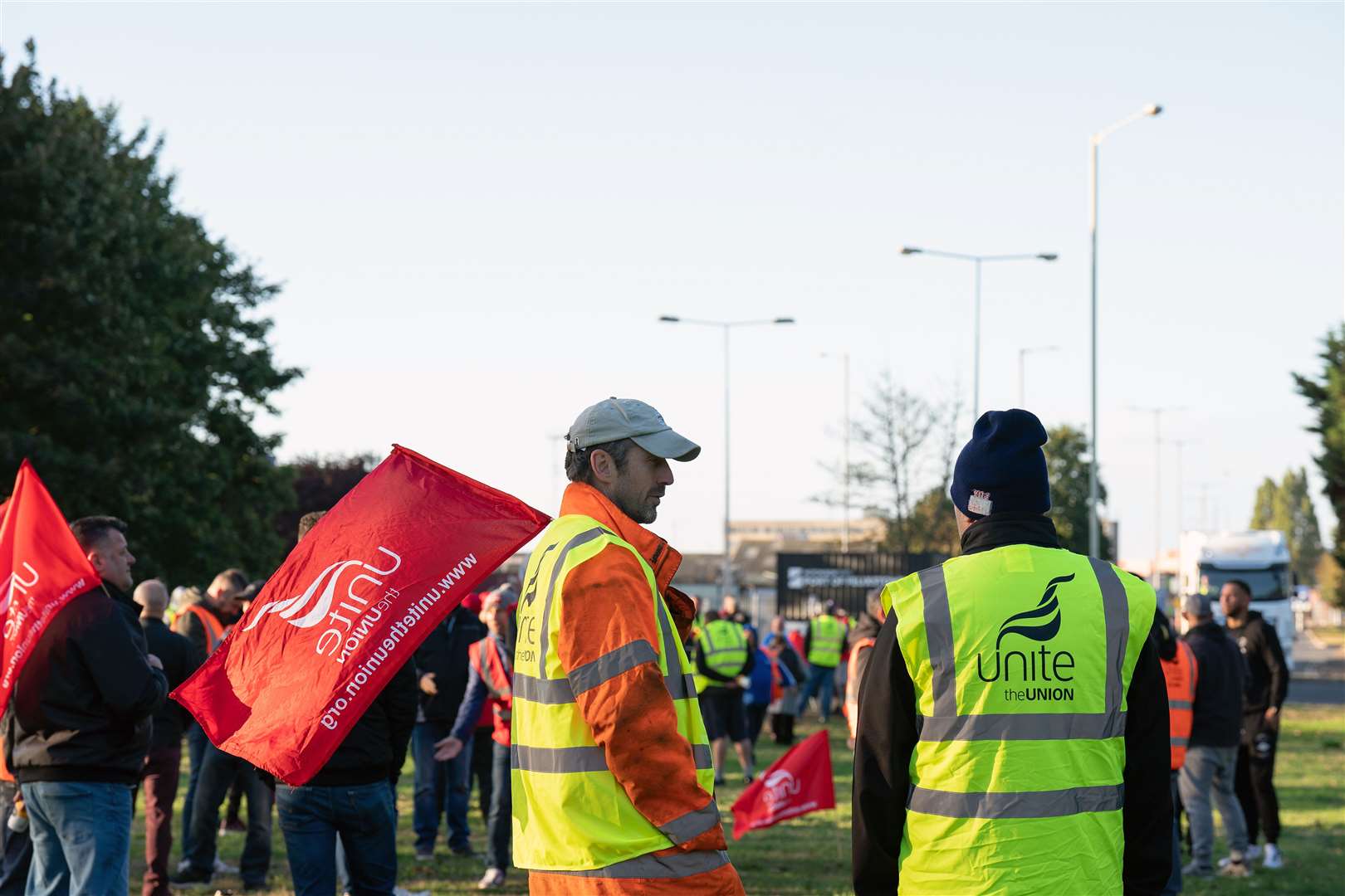 Members of the Unite union man a picket line at one of the entrances to the Port of Felixstowe in Suffolk (Joe Giddens/PA)