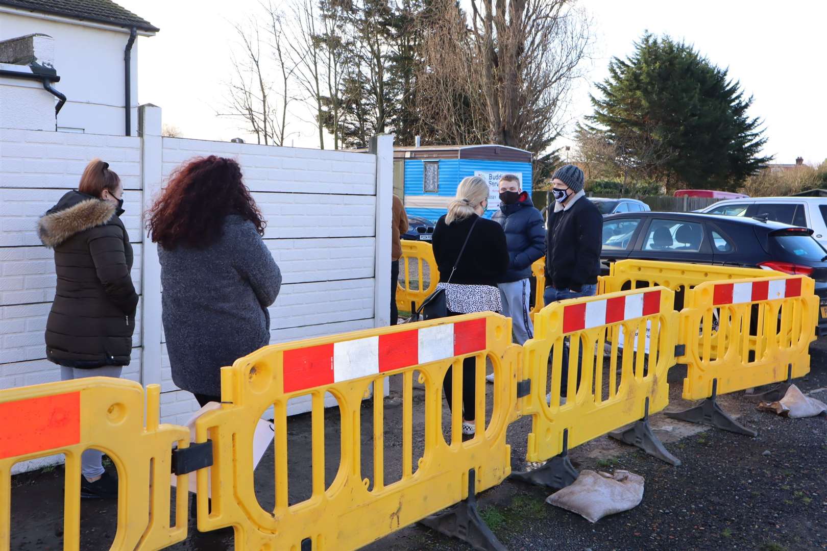 Queues outside the Sheerness East Working Men's Club coronavirus testing station at Halfway on Sheppey