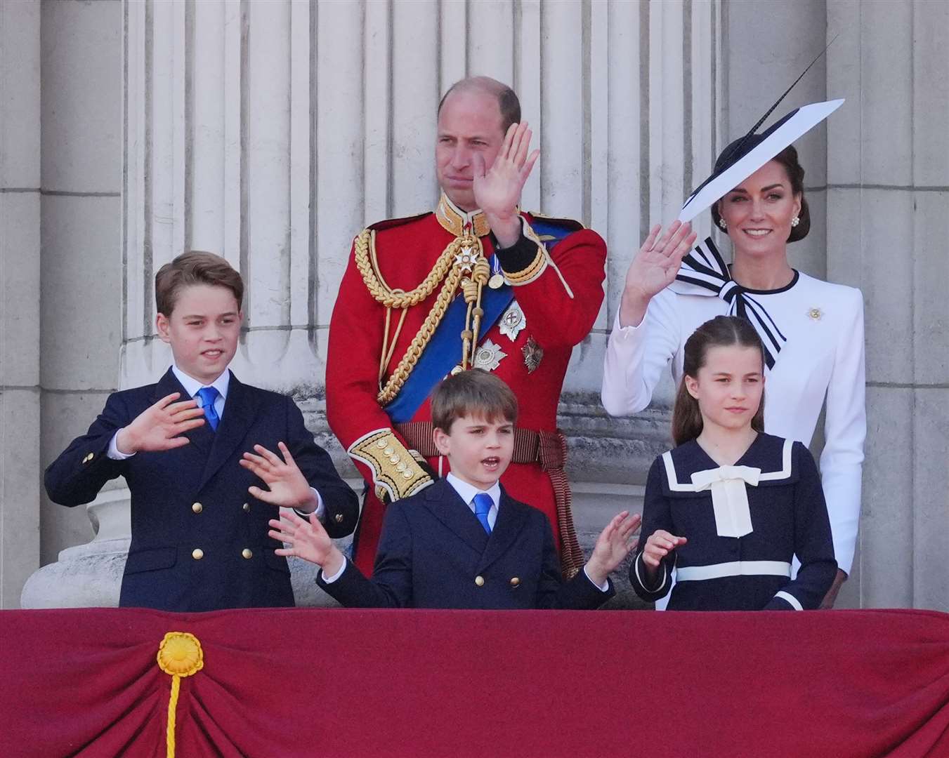 The Wales family wave from the balcony during the Trooping the Colour celebrations (Jonathan Brady/PA)