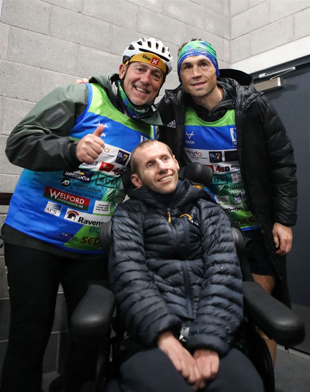 Former Leeds Rhinos player Rob Burrow (centre) supports Kevin Sinfield (right) during an ultra-marathon (Isaac Parkin/PA)