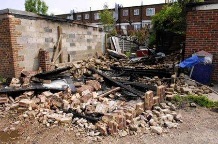 A garage destroyed by fire in Valley Drive