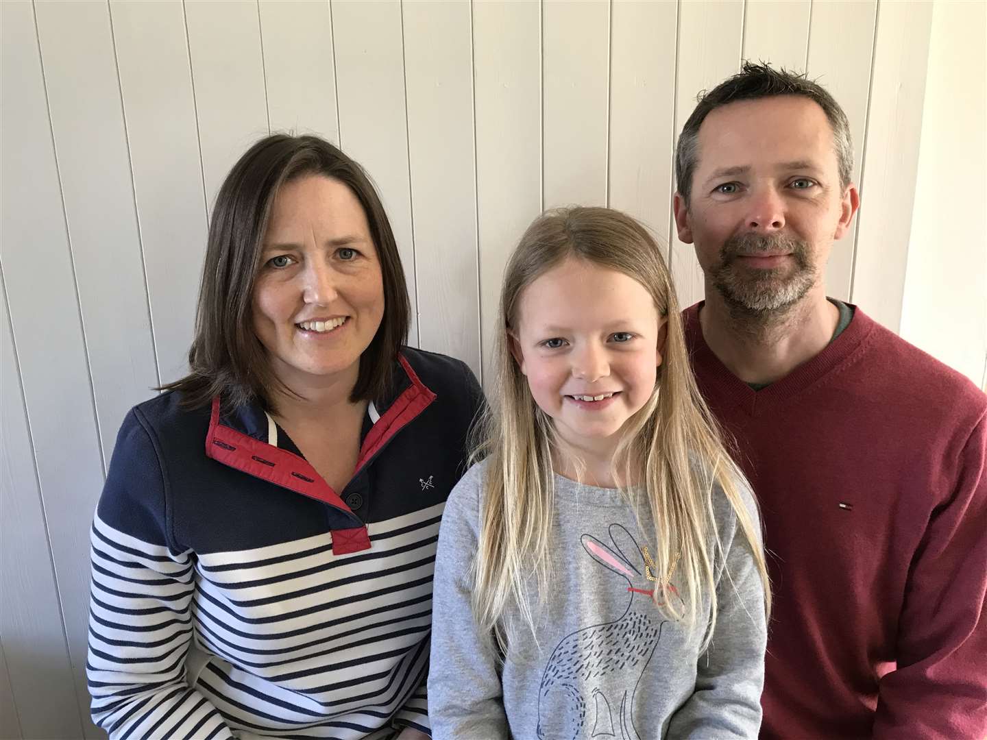 Seven-year-old Faith Wakeford with her parents Mark and Victoria (Huntington and Langham Estate/PA)