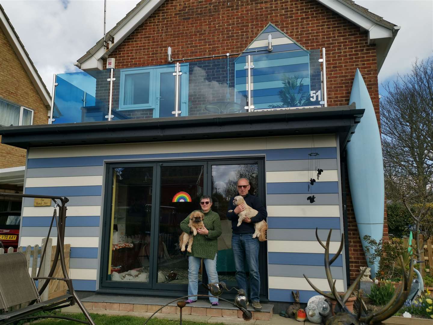 Sue and Doug Brown outside their colourful house in Ramsgate