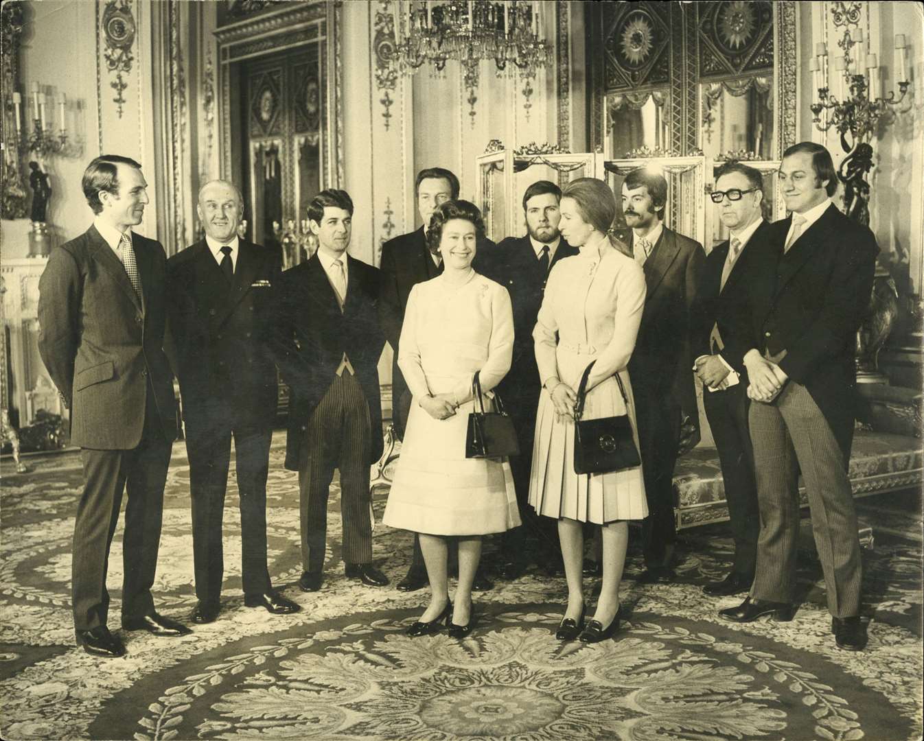 Ronnie Russell (far right) with Princess Anne, Queen Elizabeth and a group of people who had a part to play in foiling the kidnap attempt. Picture: Dix Noonan Webb