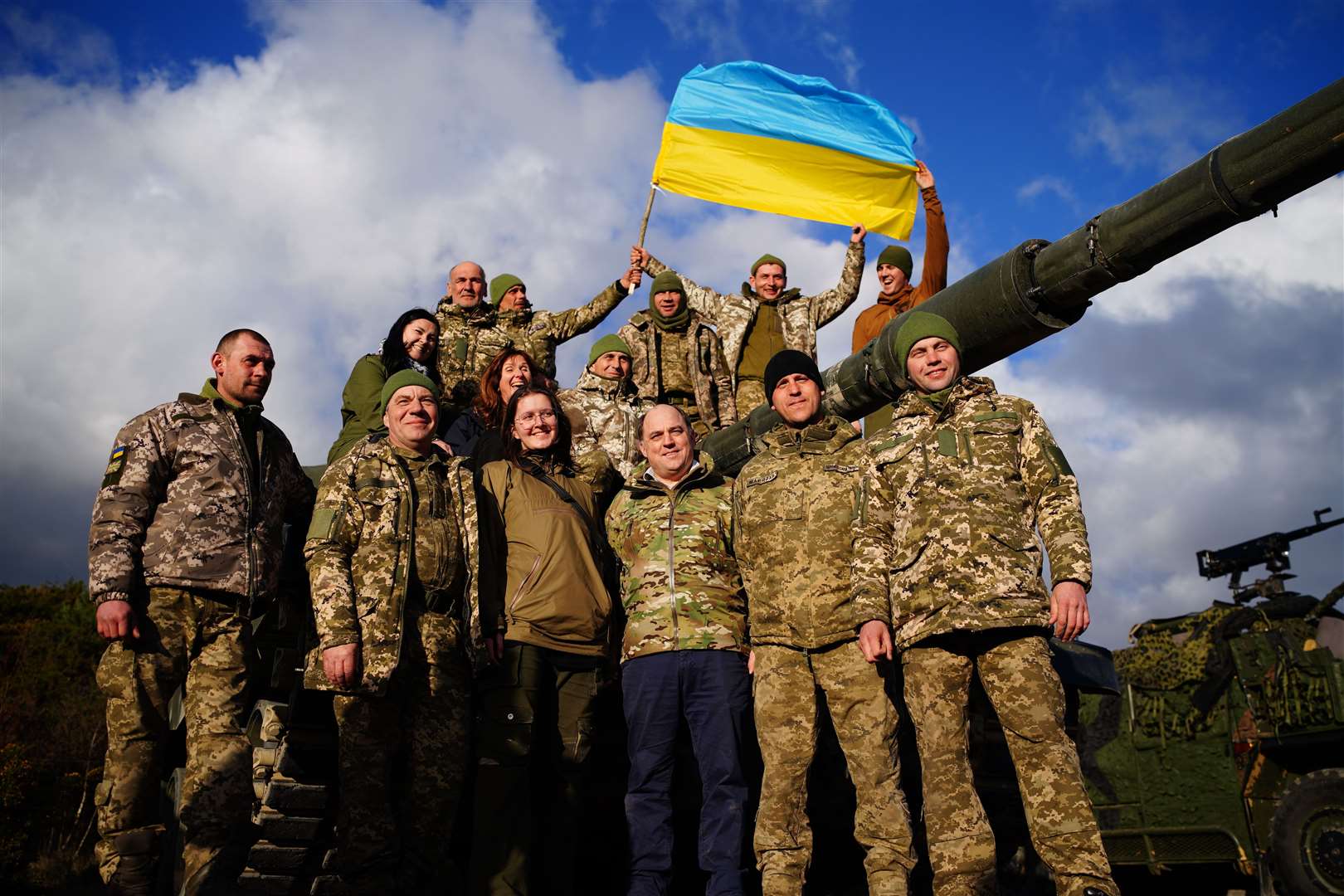 Defence Secretary Ben Wallace, centre right, with Ukrainian soldiers (Ben Birchall/PA)