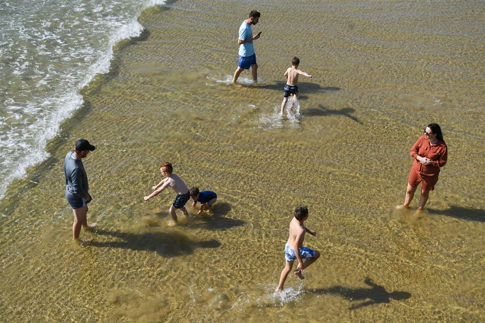 Children play on Bournemouth beach (Kirsty O’Connor/PA)