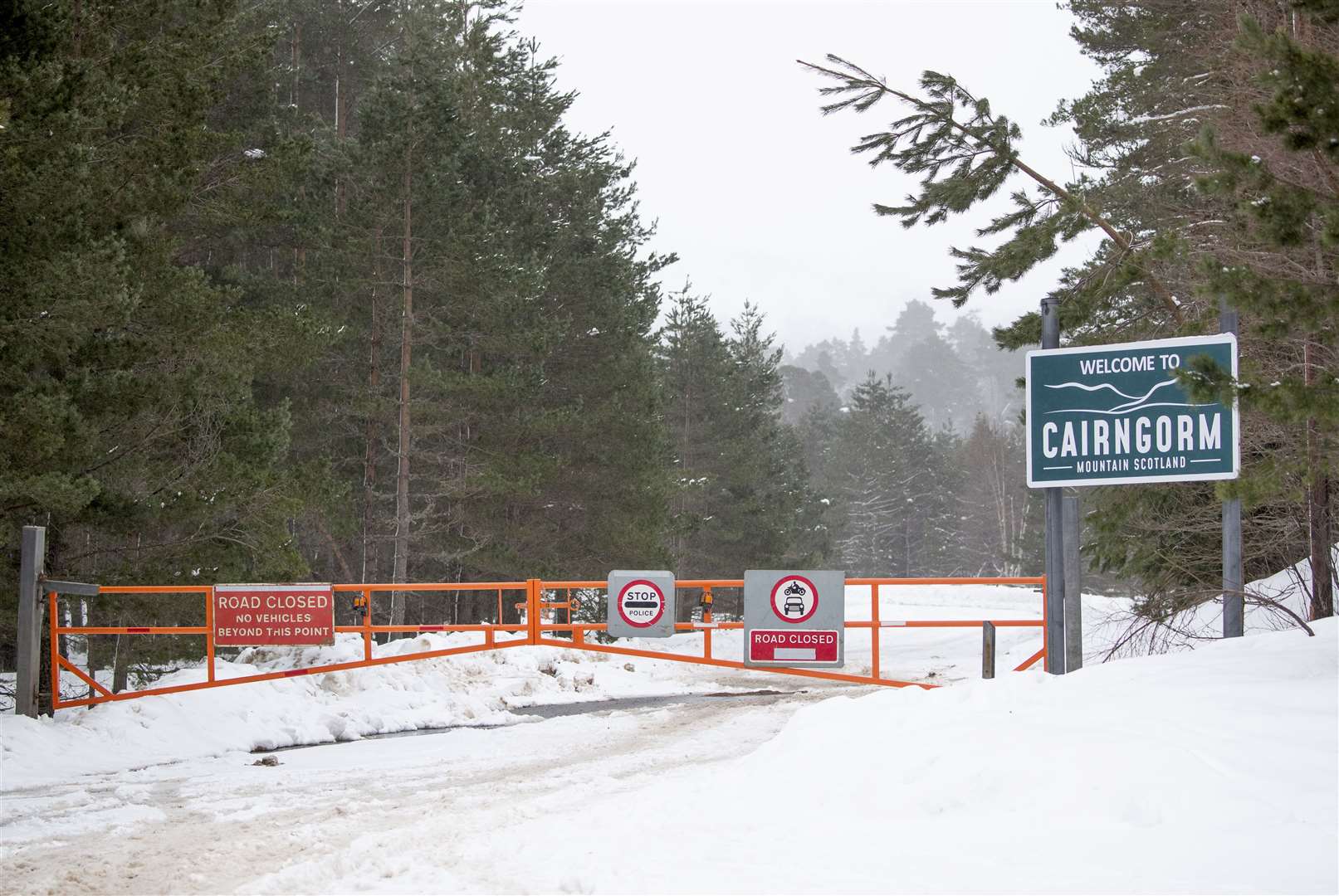 The closed snow gates on the road leading to the Cairngorm Ski Centre near Aviemore (Jane Barlow/PA)