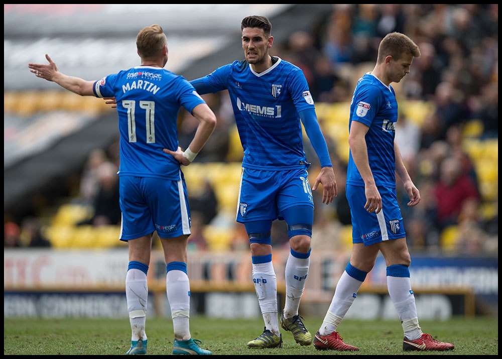 Lee Martin and Conor Wilkinson debate on the pitch Picture: Ady Kerry