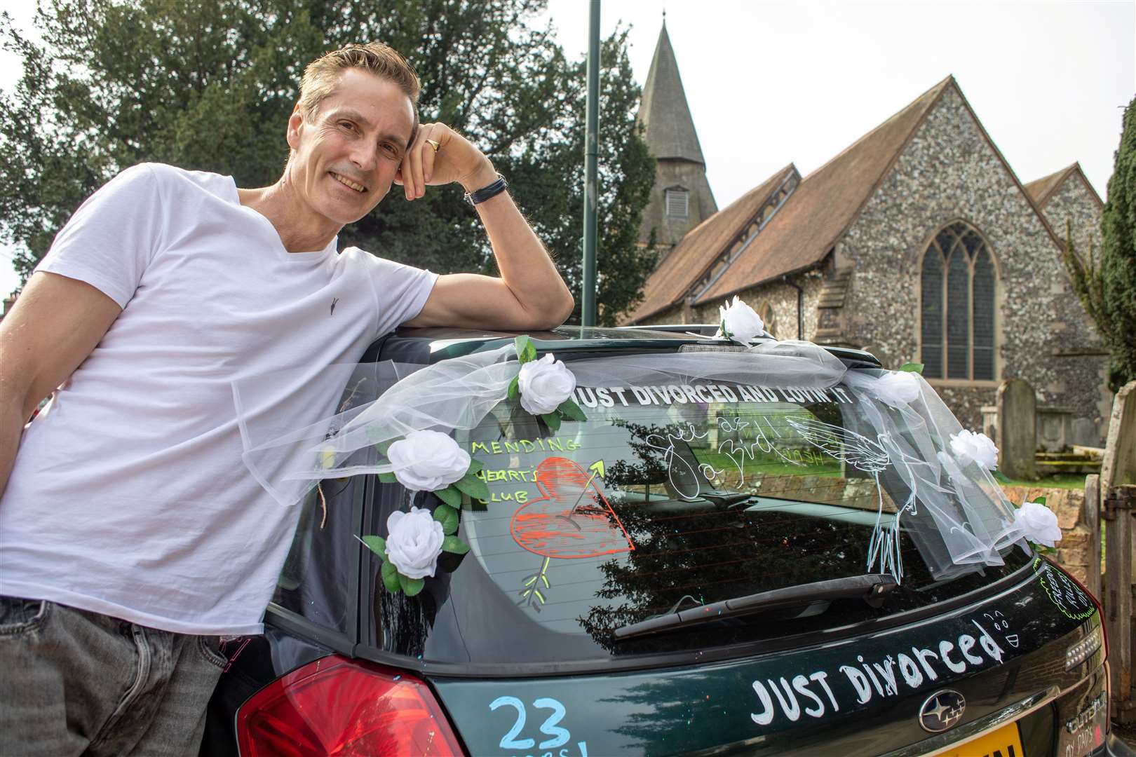 Author Angus Kennedy with his 'Just Divorced' car. Images: SWNS