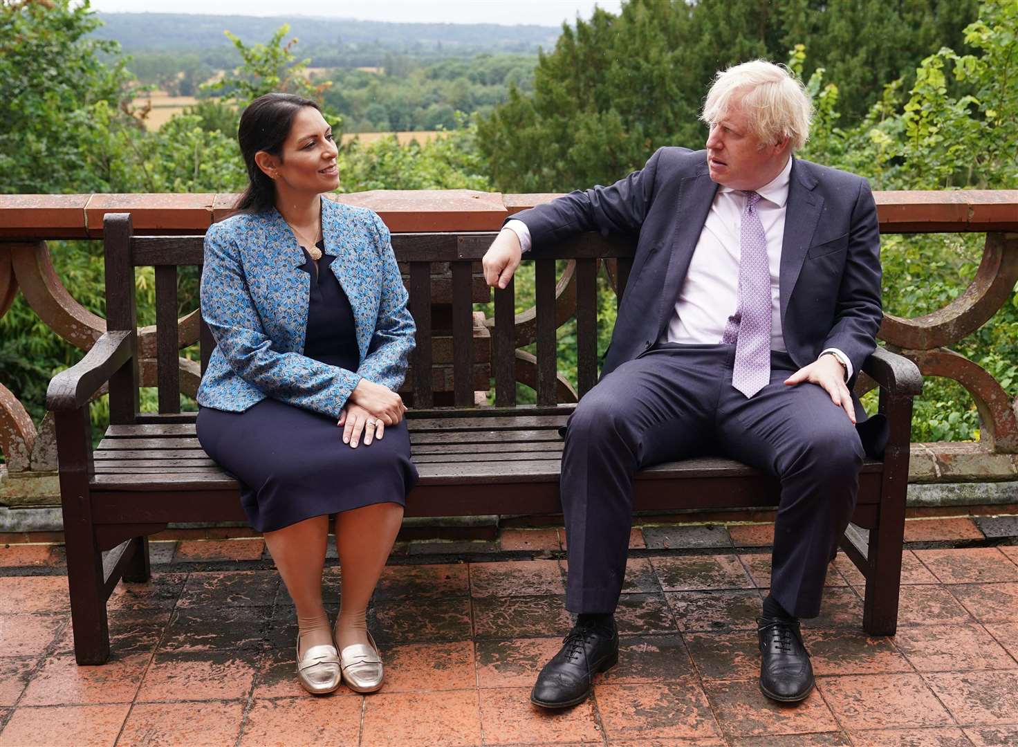 The Prime Minister, here with Home Secretary Priti Patel, is spending his first week out of isolation focusing on crime (Yui Mok/PA)