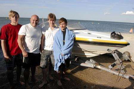 Left to right, Richard and Barry Turner, Sam Bubb and Ben Roland back on shore after their speedboat sank