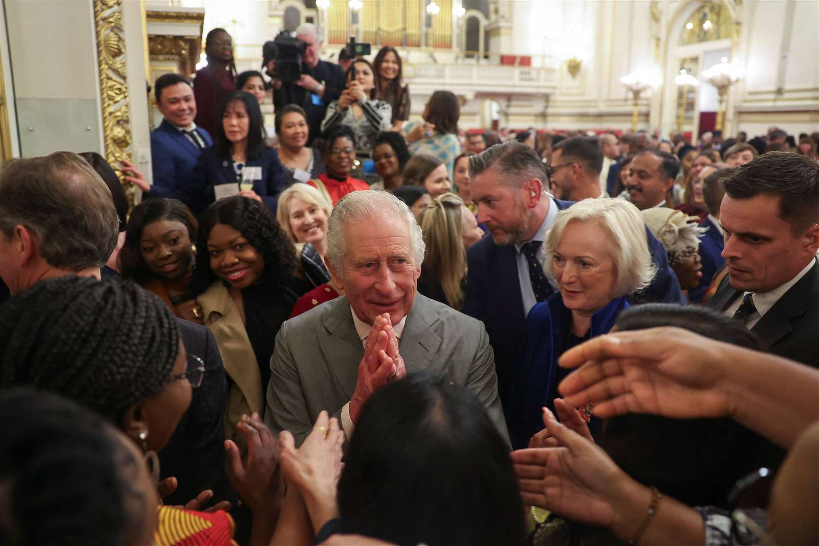 Charles during a reception on his 75th birthday to celebrate nurses and midwives working in the UK (Toby Melville/PA)