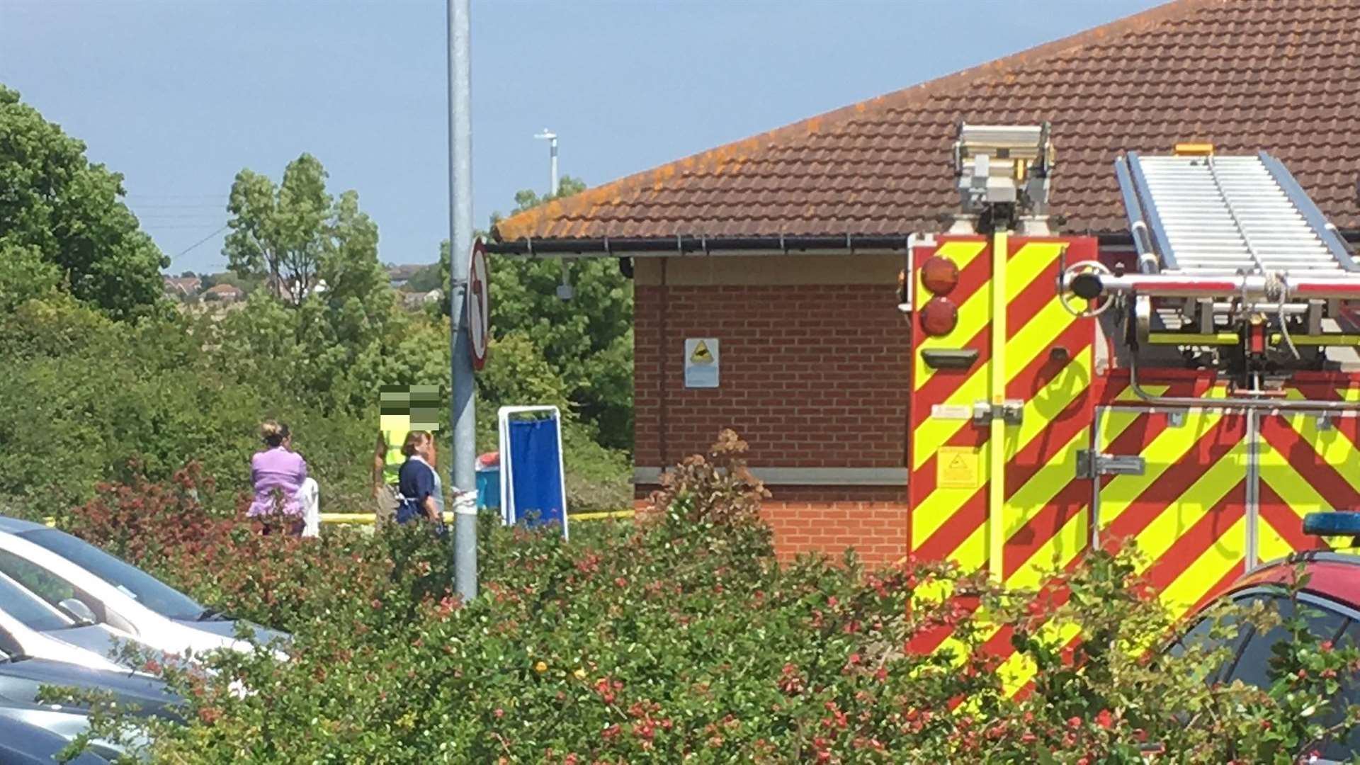 A man was kept in a cordonned off area of grass outside Sheppey Community Hospital until a decontamination expert from Kent Fire and Rescue Services arrived