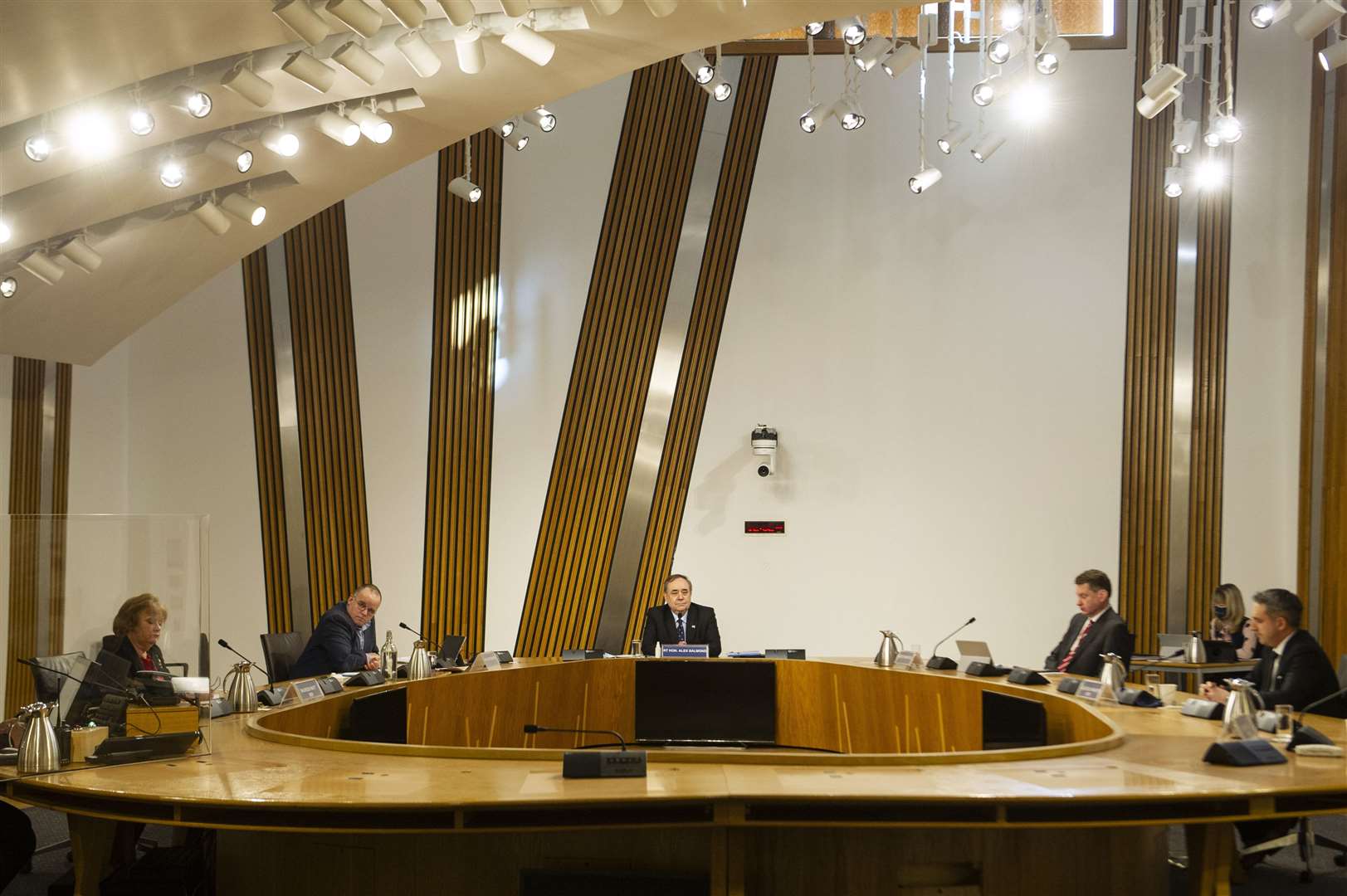 Mr Salmond, centre, appeared in person before the Holyrood committee (Andy Buchanan/PA)