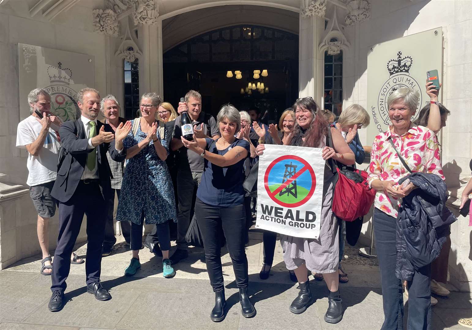 Environmental campaigner Sarah Finch (centre) with supporters outside the Supreme Court in London (Callum Parke/PA)