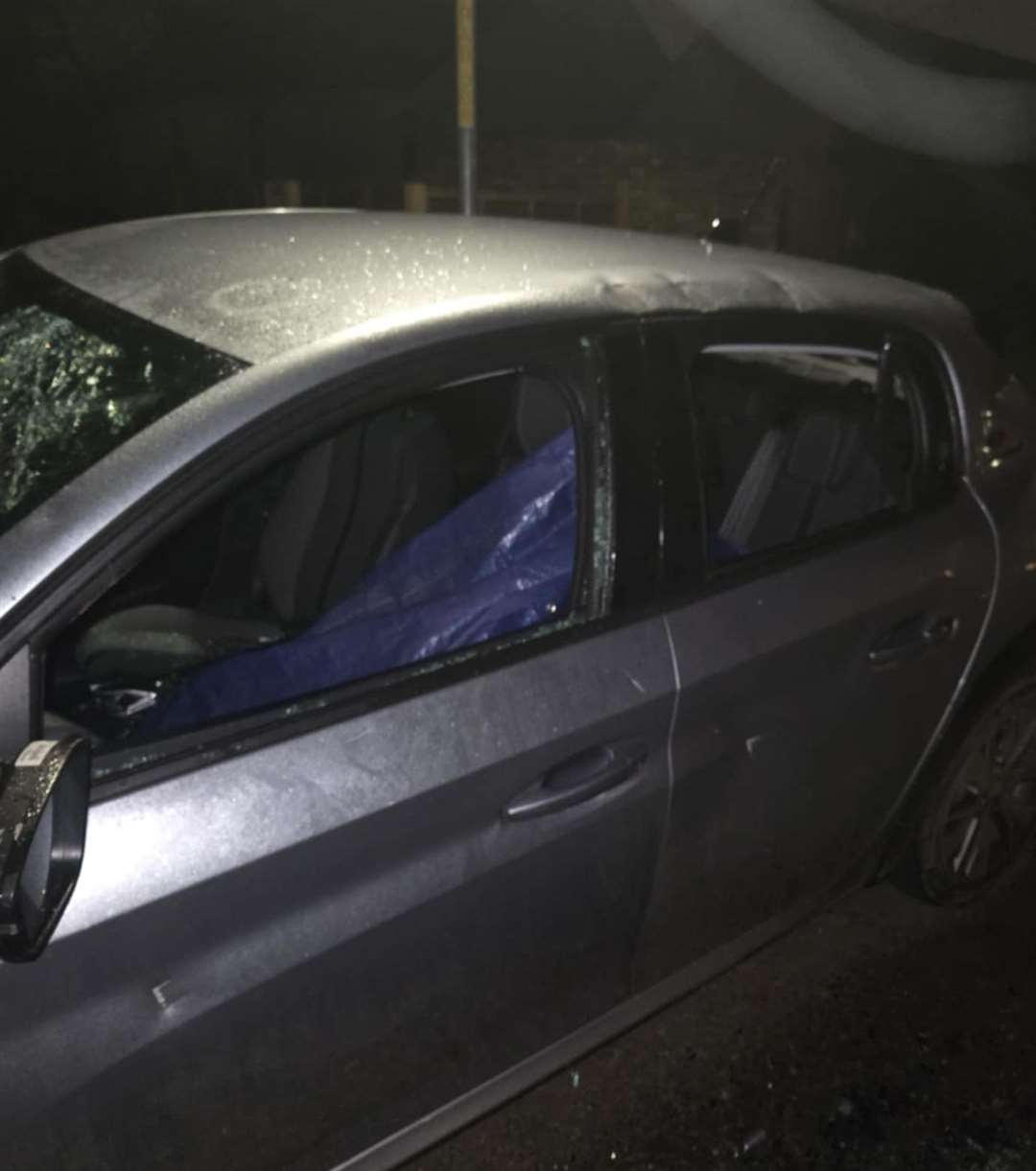 The damage to Logan Heasman’s electric Peugeot 208 in Paddock Close near the junction with Towers Wood in Darenth at around 10.10pm on December 23. Picture: Logan Heasman