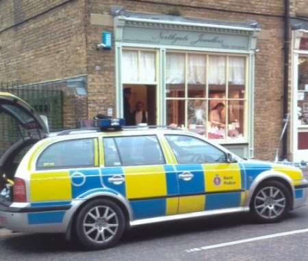 Police at the scene of the robbery on Friday. Picture courtesy Matthew Bray