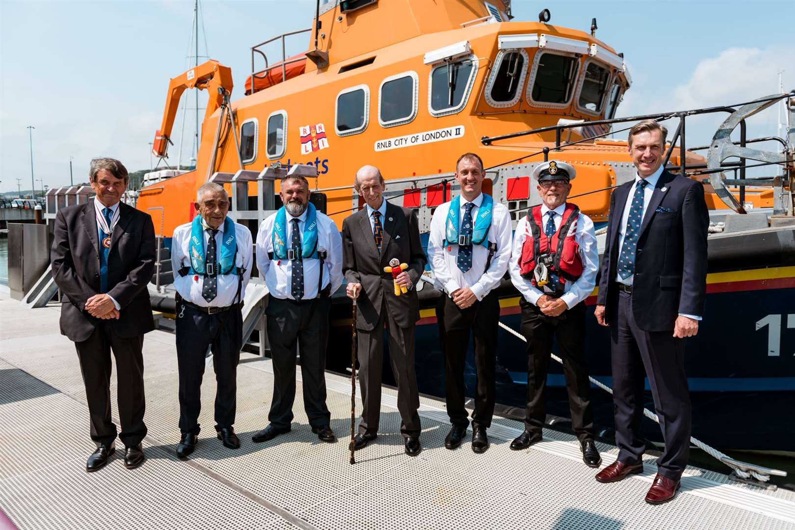 Left to right: Vice Lord-Lieutenant of Kent Trevor Minter OBE, Tony Hawkins, Paul Higgs, Duke of Kent, Danny Wilkins, Jon Miell and Peter Sparkes. The Duke of Kent visited Dover RNLI's lifeboat station. Picture: Dover Media Group