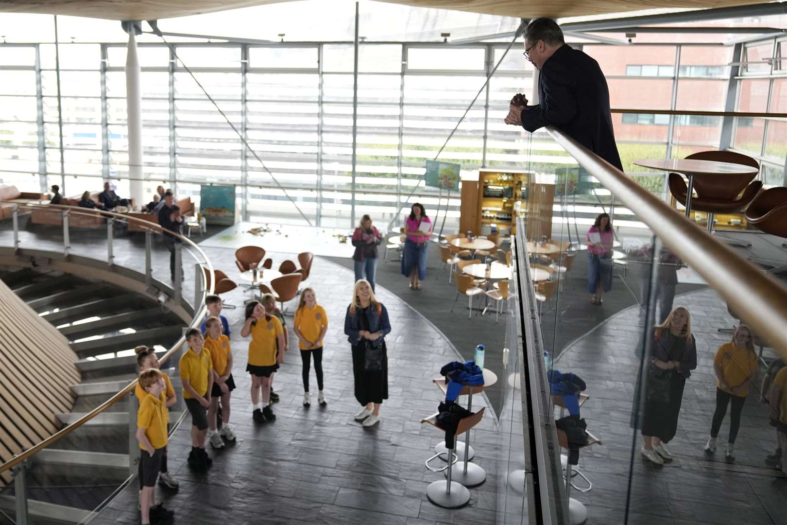 Prime Minister Sir Keir Starmer listens to a choir at the Senedd in Cardiff (Alastair Grant/PA)