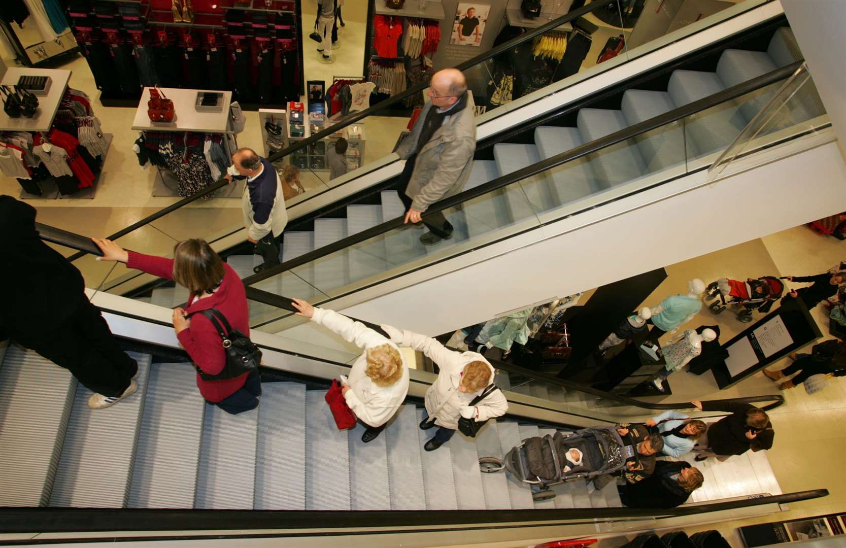 Shoppers enjoying the three-storey Debenhams on its opening day