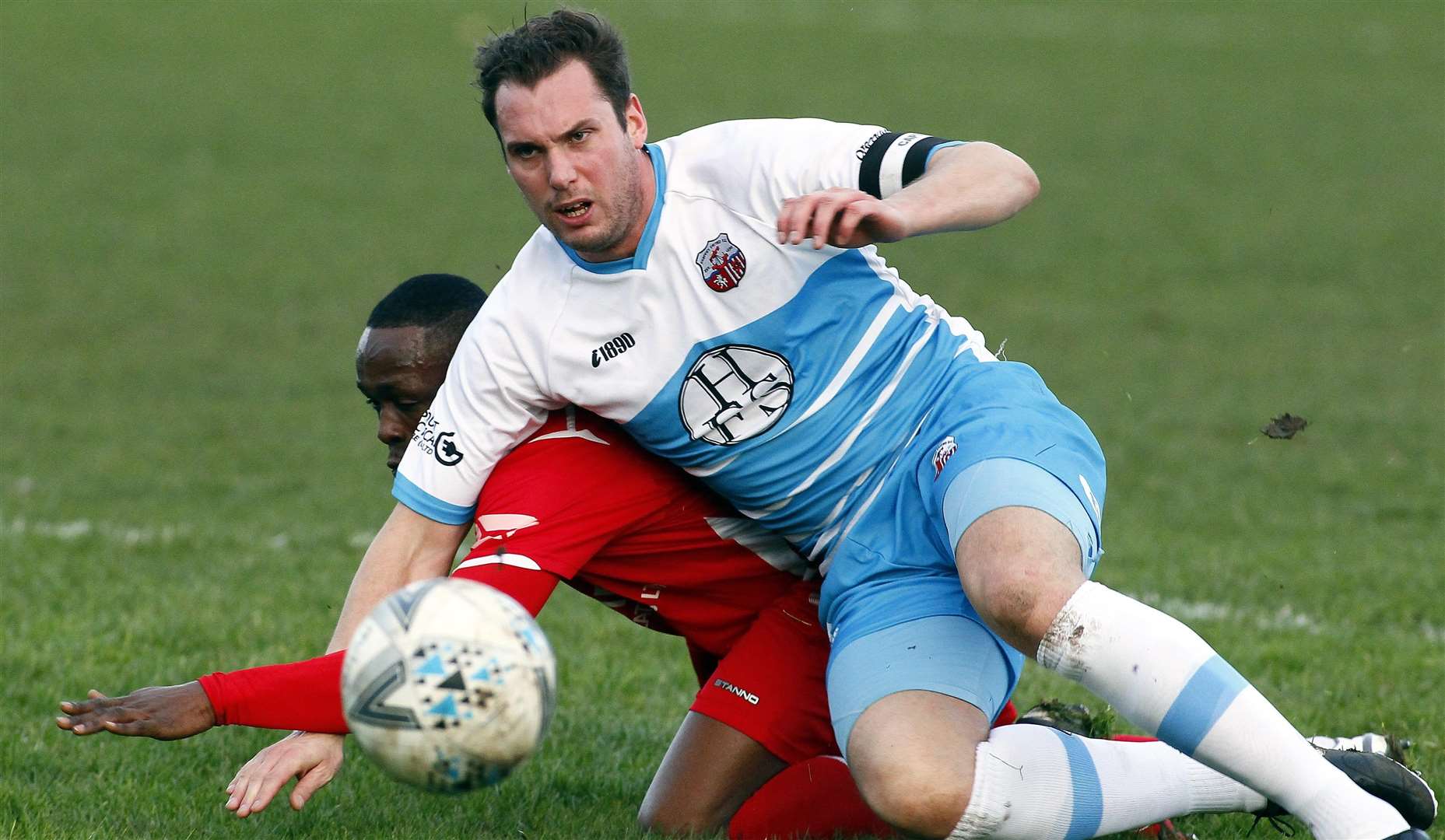 Sheppey's Jono Richardson gets to the ball first. Picture: Sean Aidan FM6246340