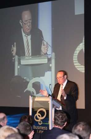 Broadcaster Andrew Neil addresses the meeting