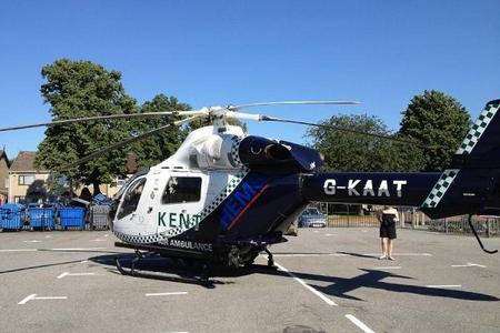 An air ambulance lands at Dartford Grammar School for Boys after a man is critically injured nearby. Picture: Joseph Hashim